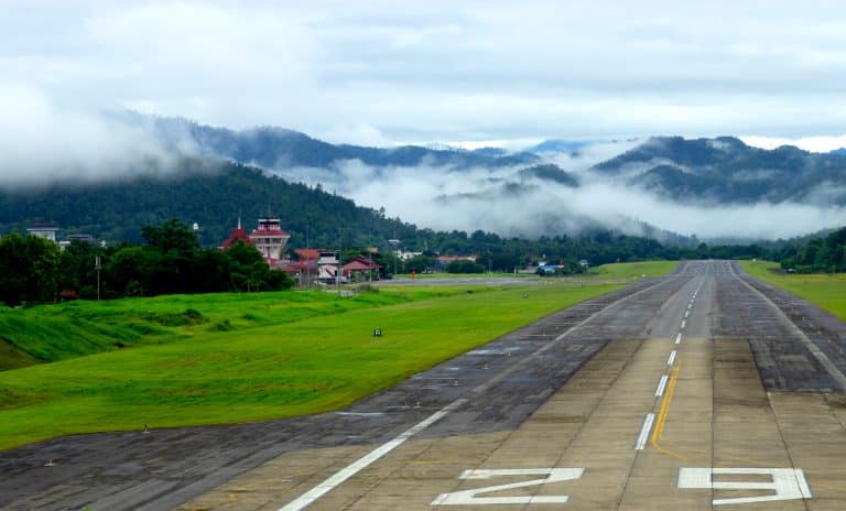 Airport runway with mountain in countryside